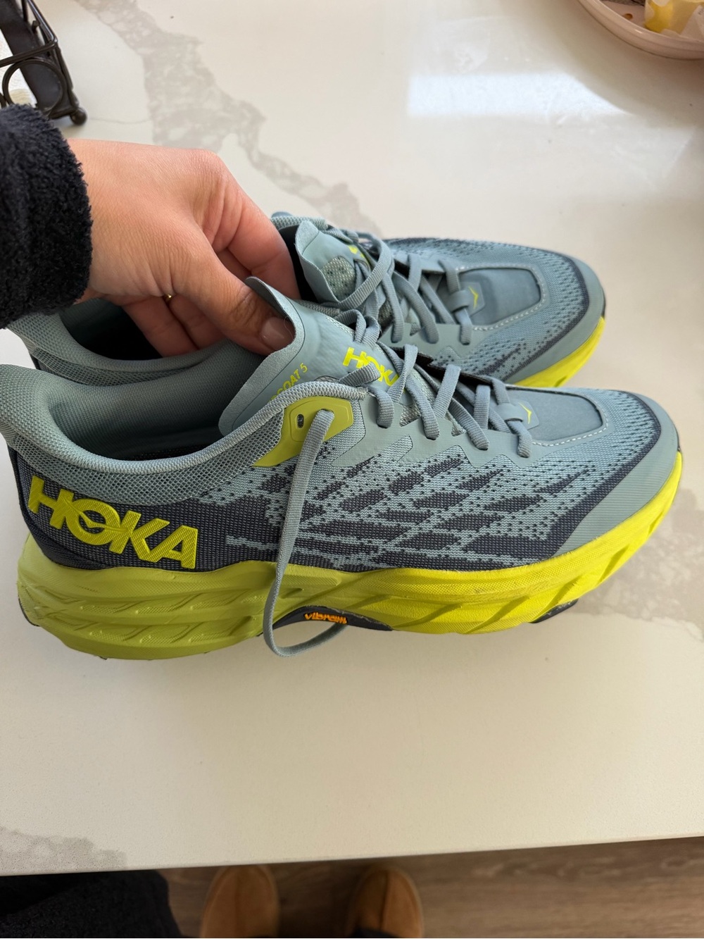 Hoka Men's Speedgoat 5 sneakers in the "Stone Blue Citron" colorway 9.5